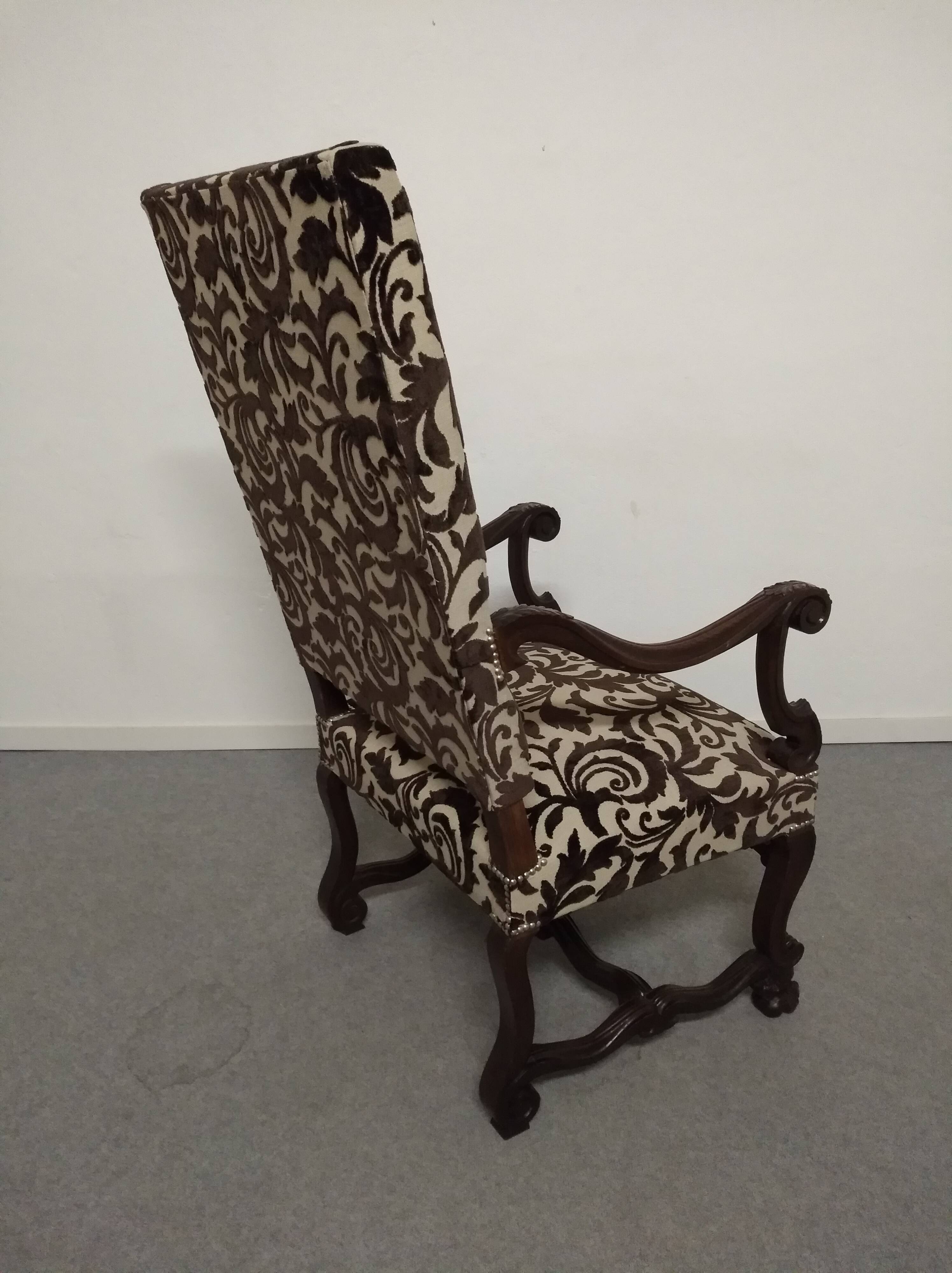Pair of ceremonial armchairs in blackened oak, France late 18th century.