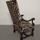 Pair of ceremonial armchairs in blackened oak, France late 18th century.
