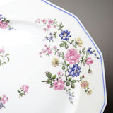 4 flat plates by Bernardaud, Limoges porcelain, floral decoration from the 1920s to 1950s.