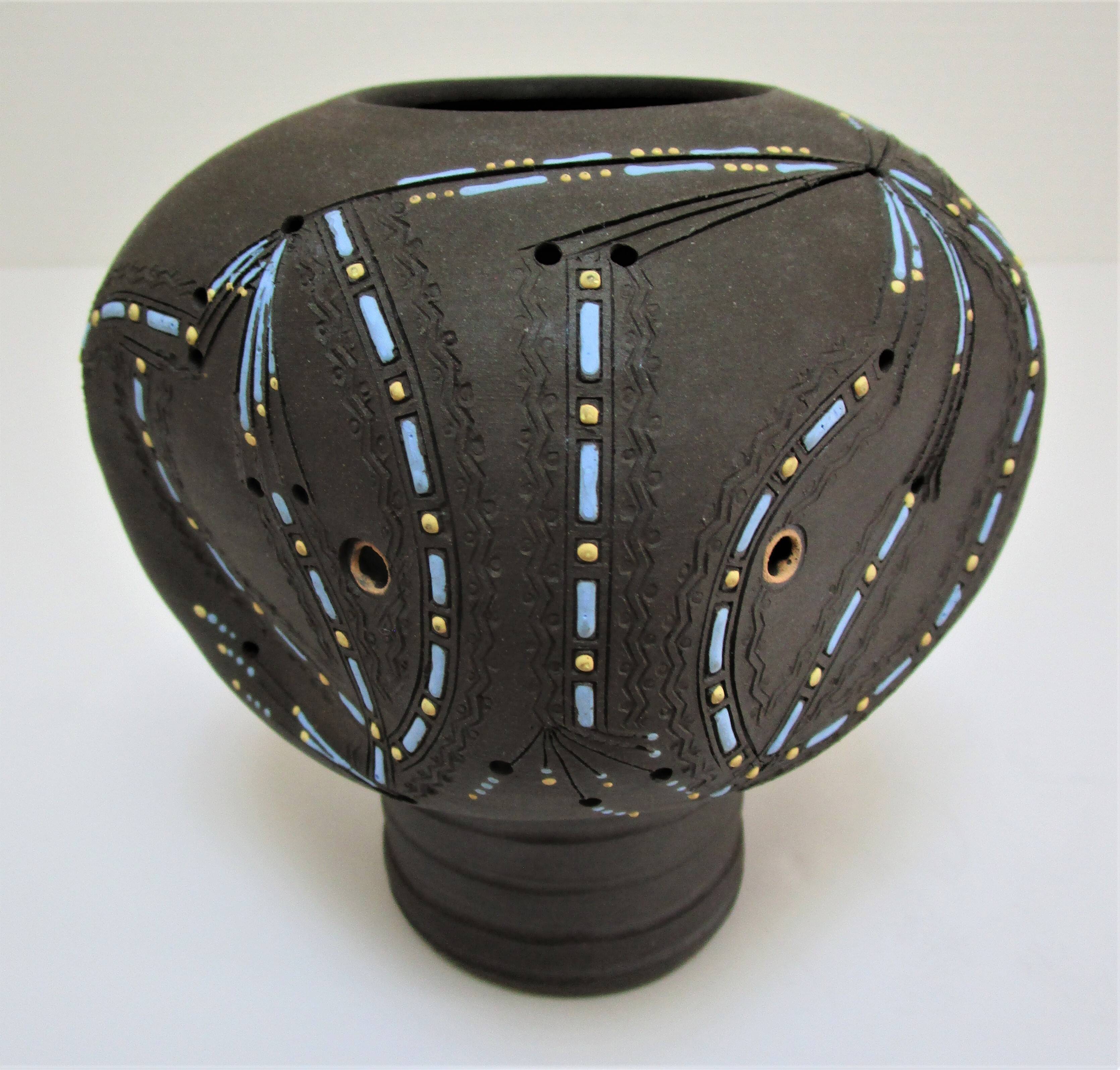 Anthropomorphic candle holder, scarified ceramic, stamped design