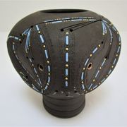Anthropomorphic candle holder, scarified ceramic, stamped design