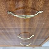 1950s chest of drawers covered in walnut with brass handles