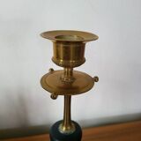 Pair of brass and black hard stone candlesticks