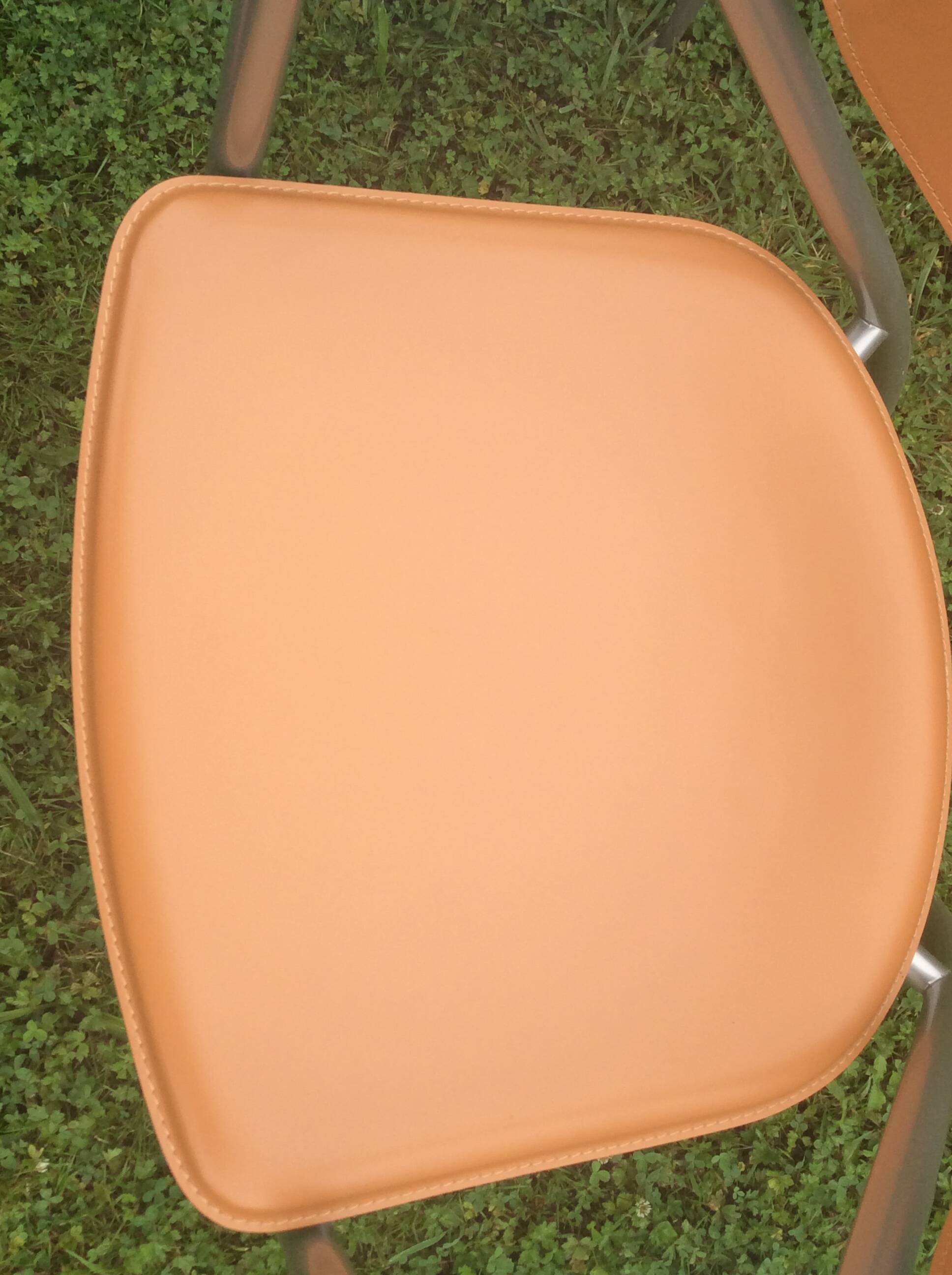 Leather and metal armchairs