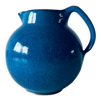 Old pitcher in glazed stoneware