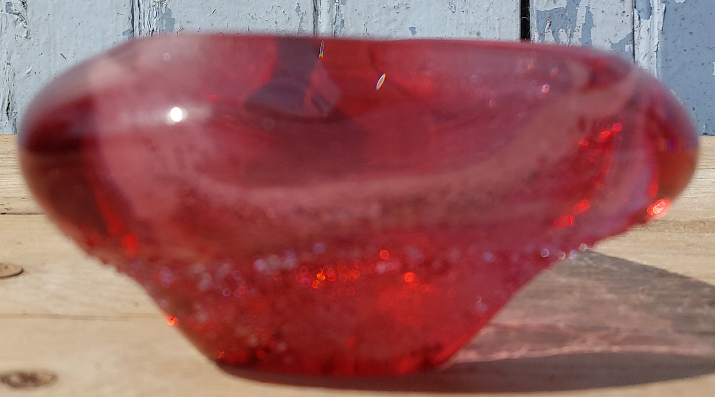 Empty pink blown glass pocket