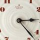 Clock in the shape of a round plate Junghans
