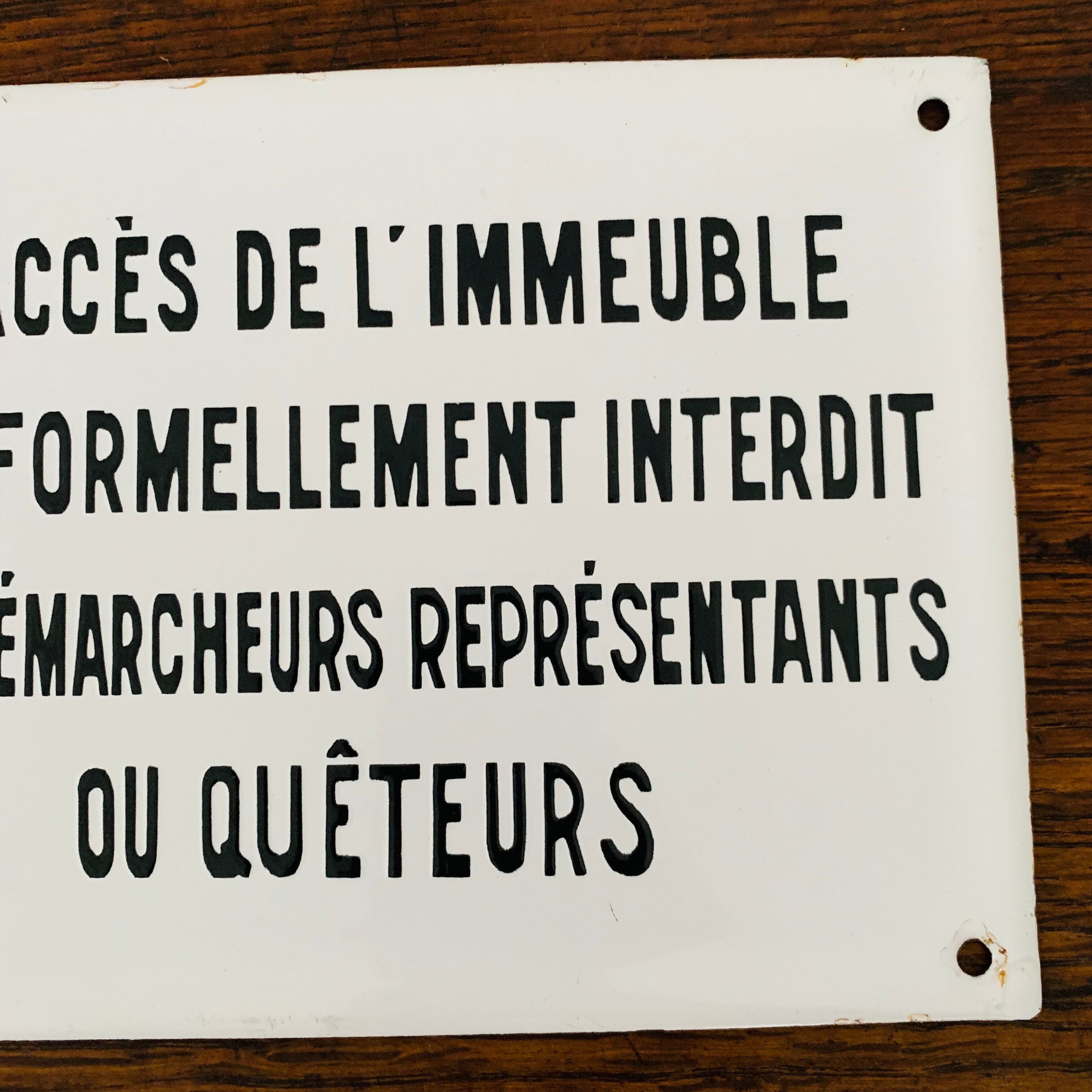 Old enamelled plaque of building