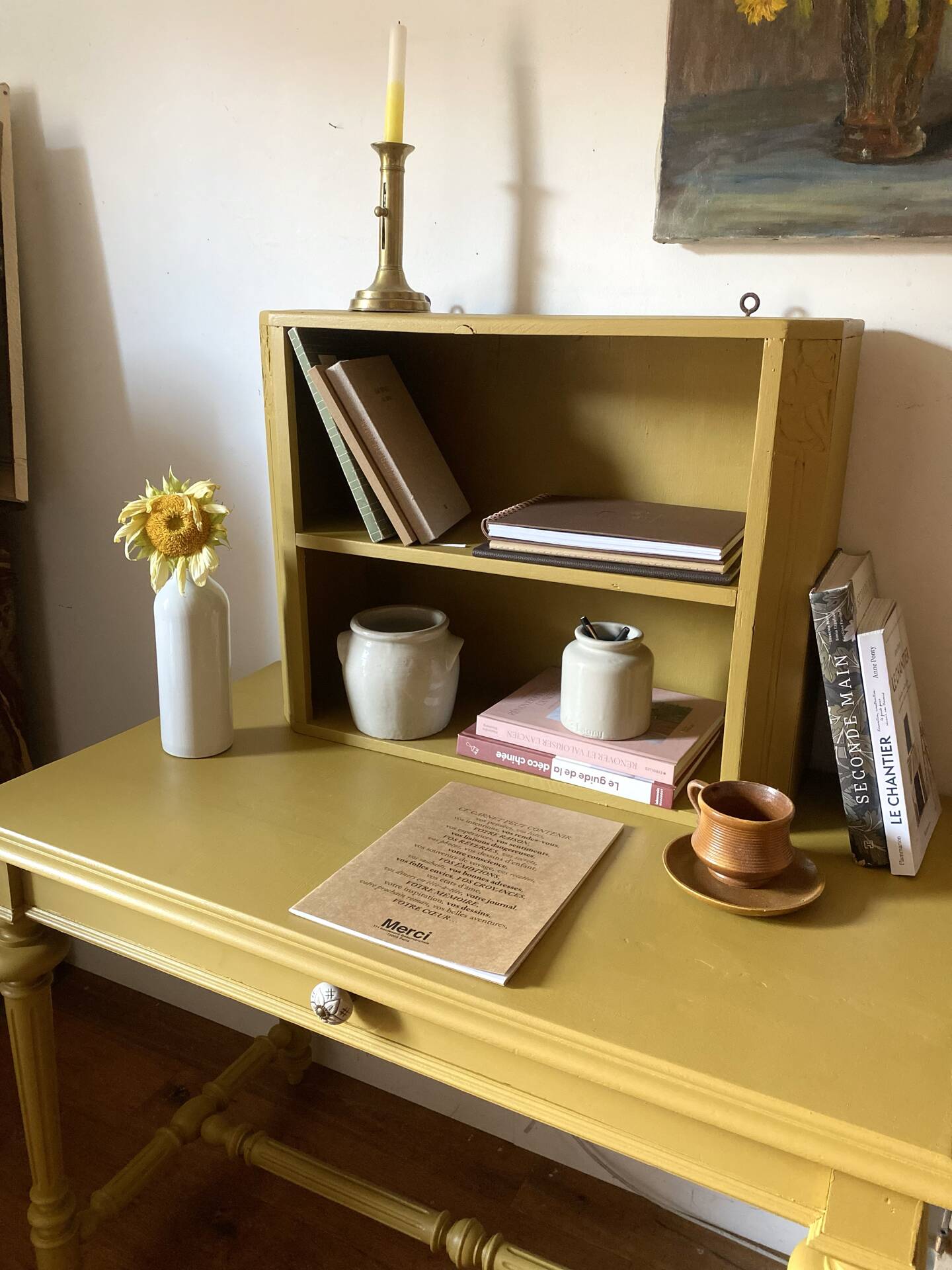 Desk table from the late 19th century, painted mustard, with turned stretcher.
