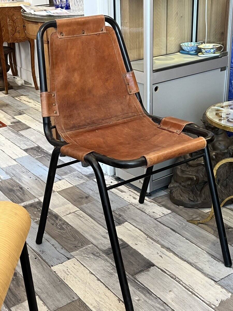 Pair of Metal and Leather Chairs, after Charlotte Perriand for Les Arcs, circa 1960.
