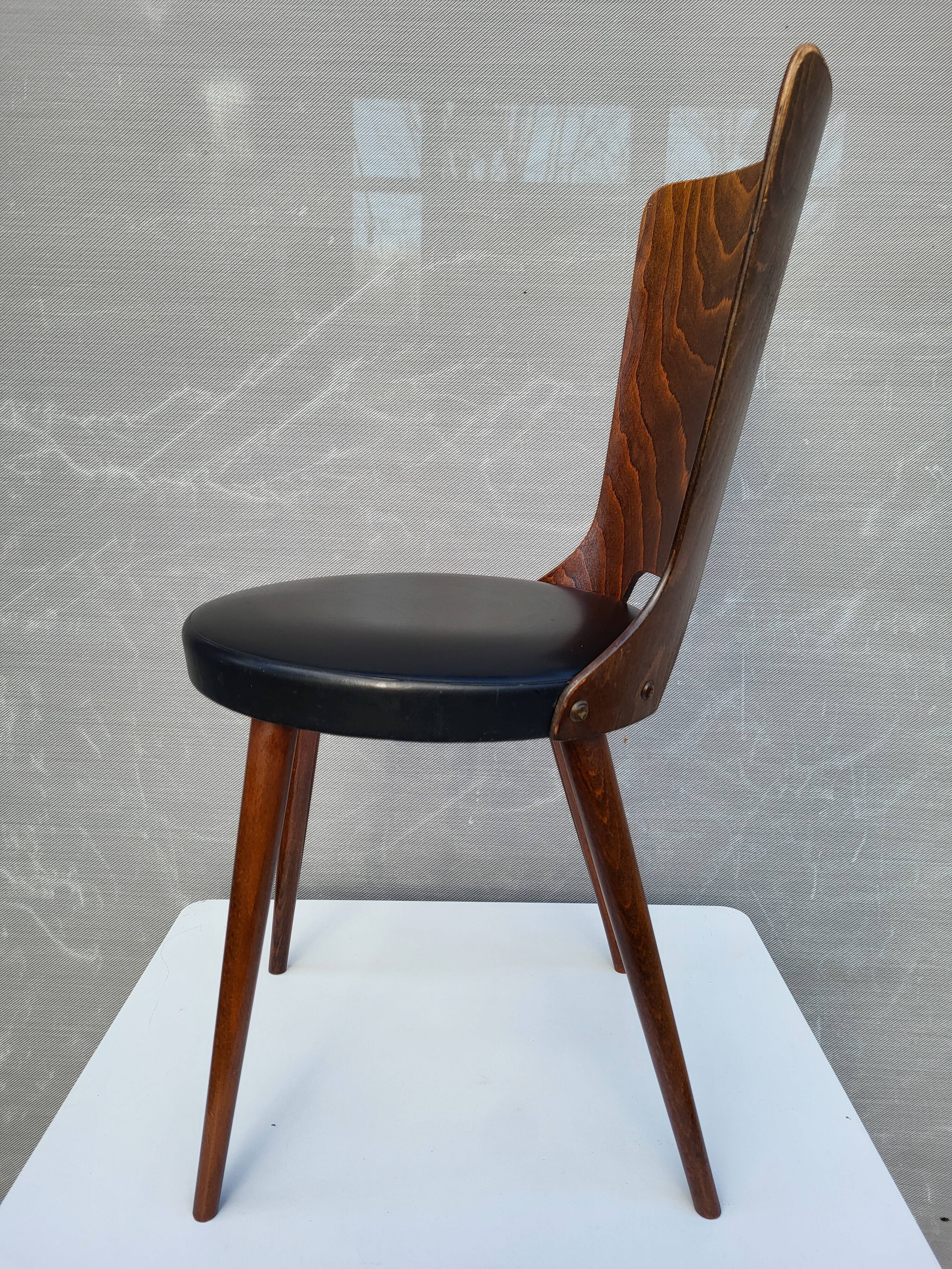 Pair of Dove chairs • Baumann • Black faux leather