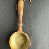 Ladle and sandstone strainer