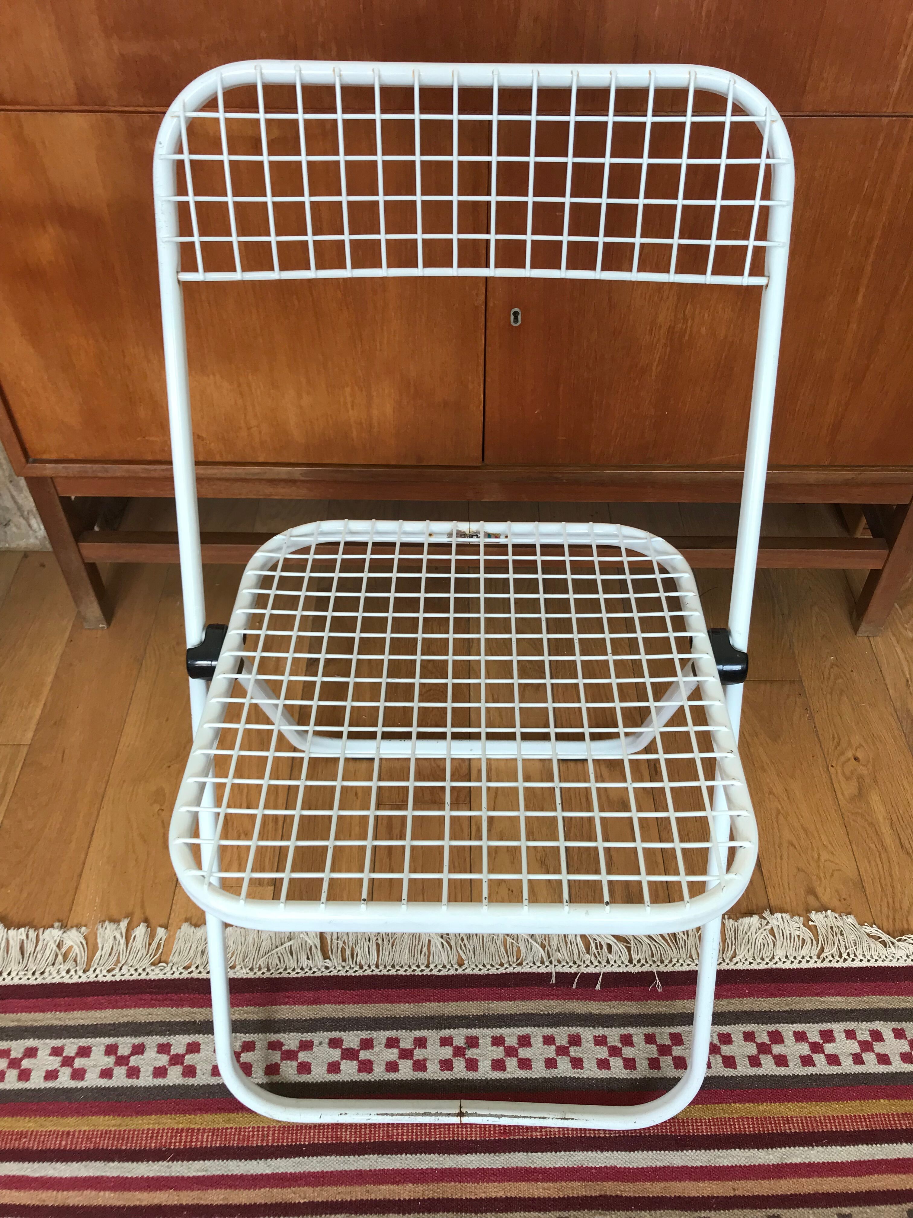 Metal folding chair by Talin Editions