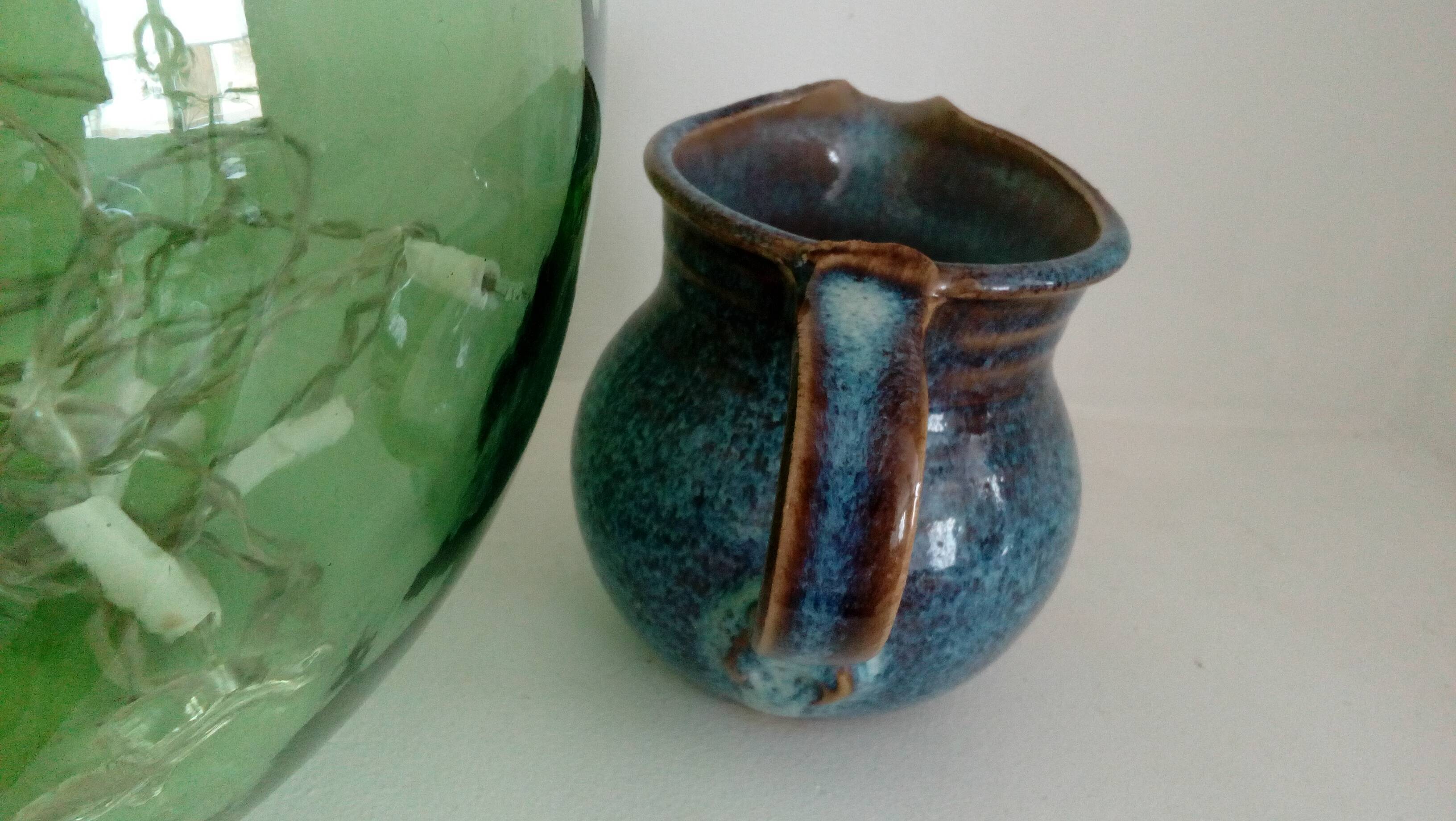 Pitcher in enamelled blue sandstone