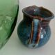 Pitcher in enamelled blue sandstone