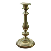 Elegant antique brass candlestick, with a slender silhouette and beautiful turned work.