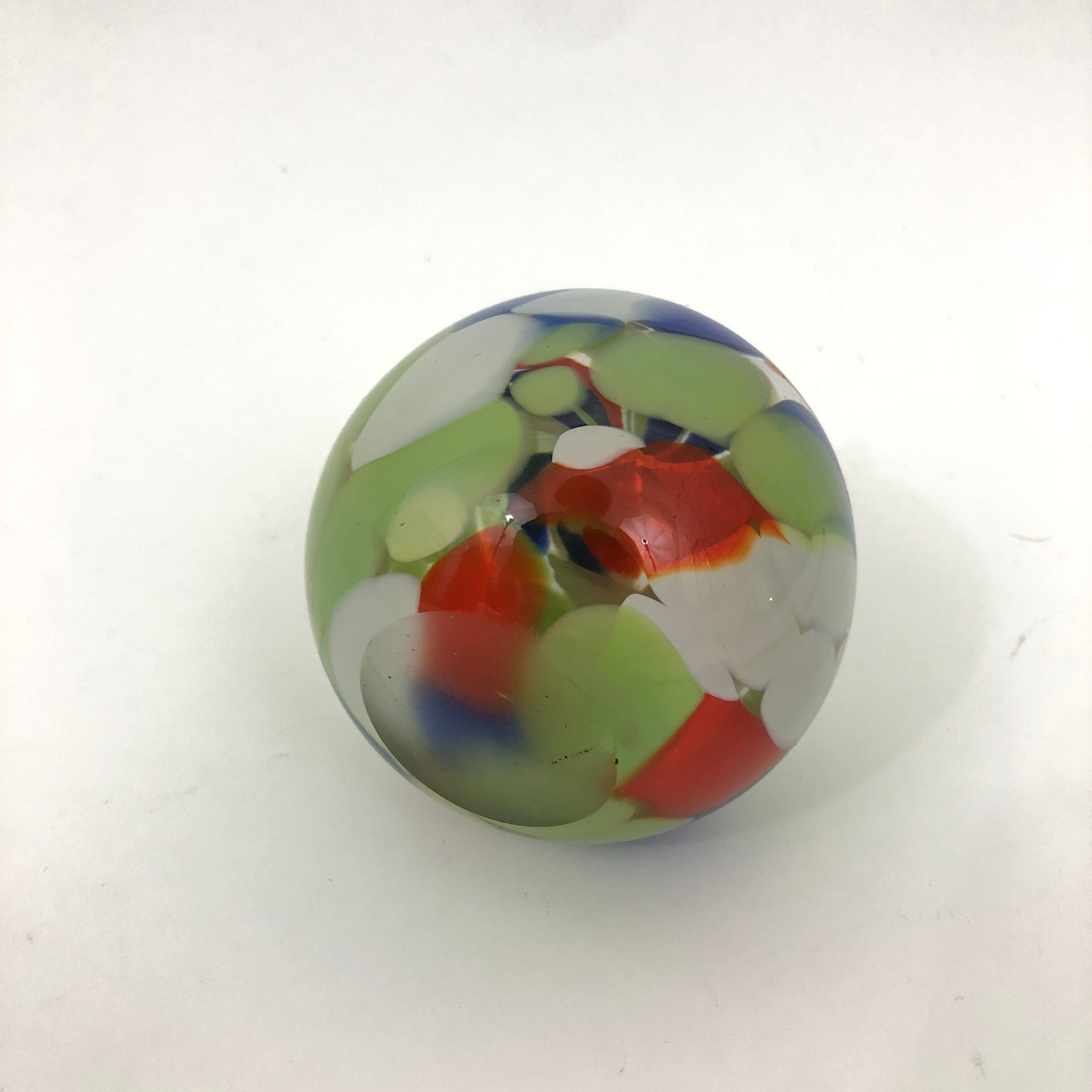 Paper press or sculpture in the shape of an apple