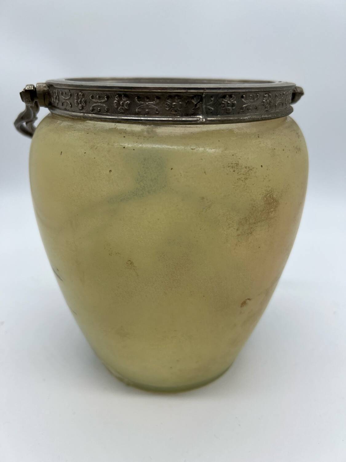 Old enameled glass cookie jar with mill decor