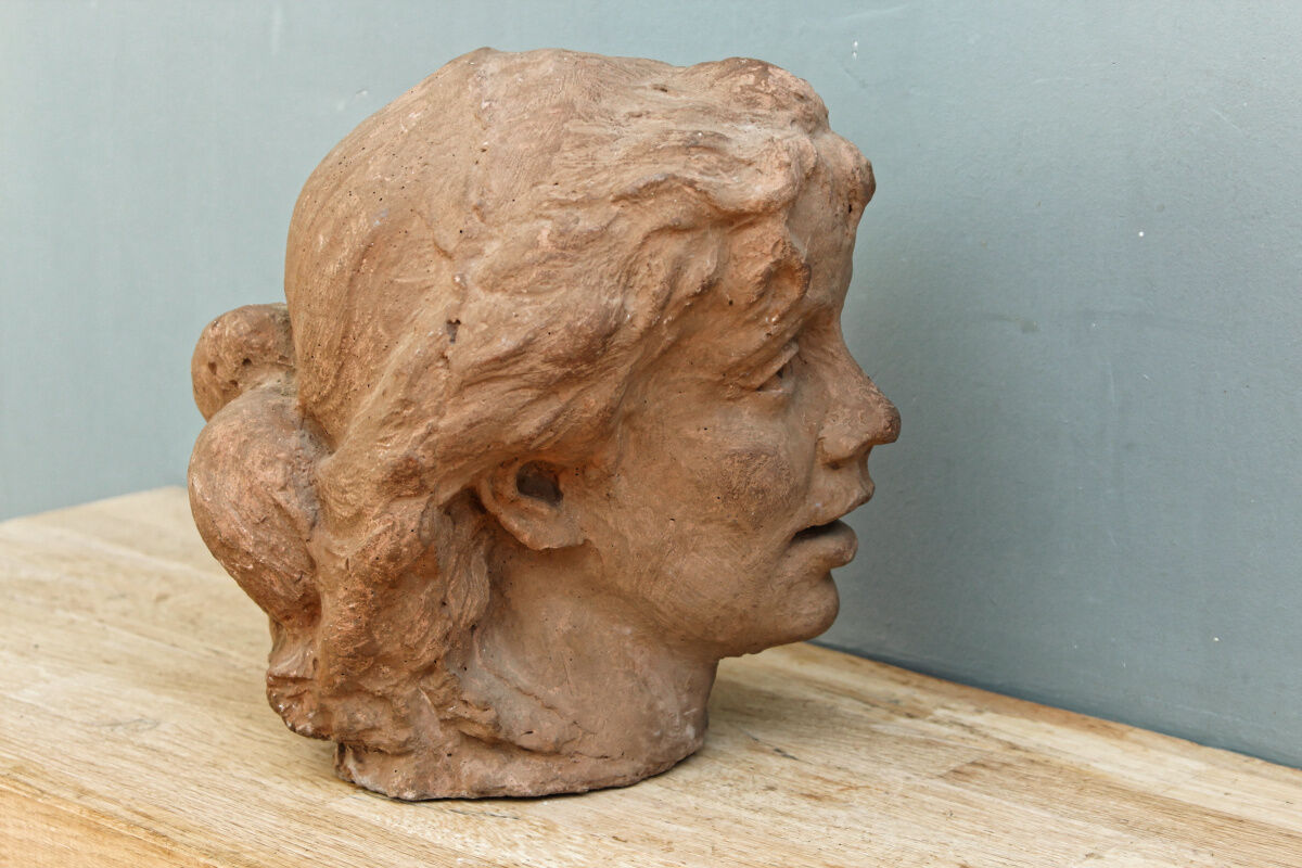 Woman's head, reconstituted stone