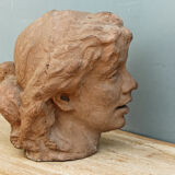 Woman's head, reconstituted stone