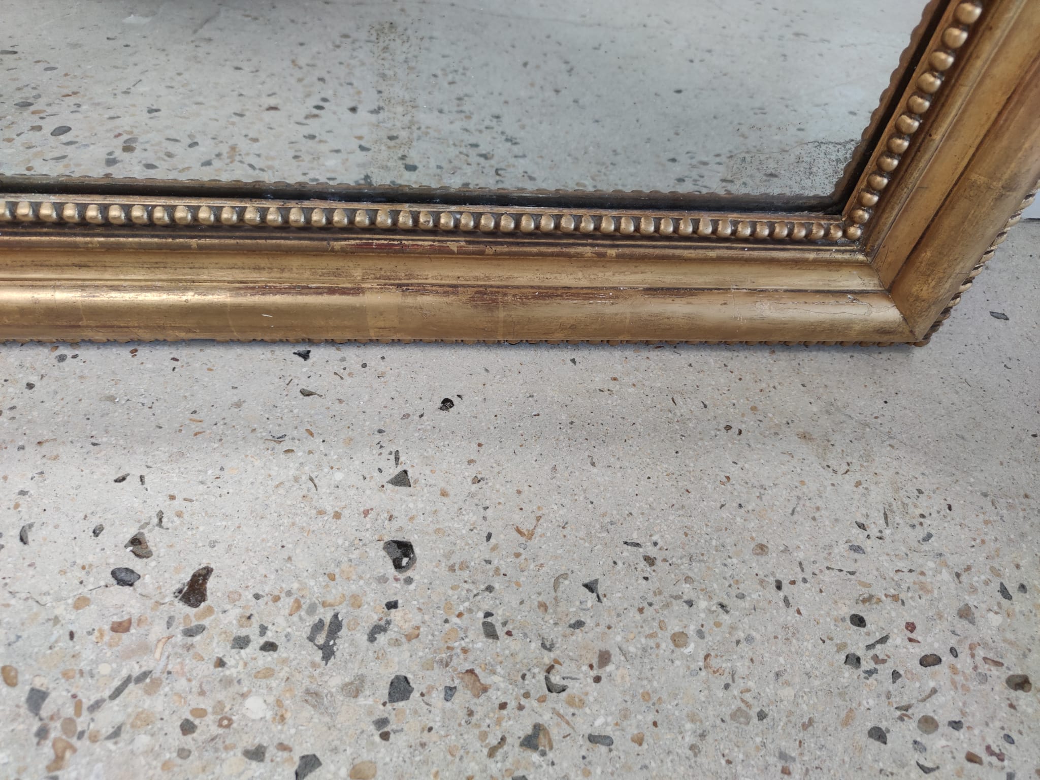 Louis Philippe gilded mirror with gendarme hat nineteenth H:130cm
