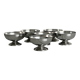 Set of 6 low footed bowls in mirror stainless steel.