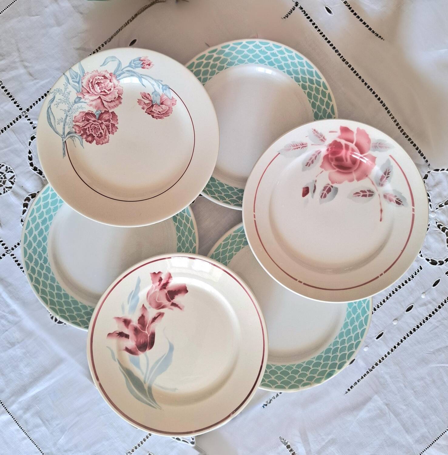 Mismatched antique flat plates in earthenware.