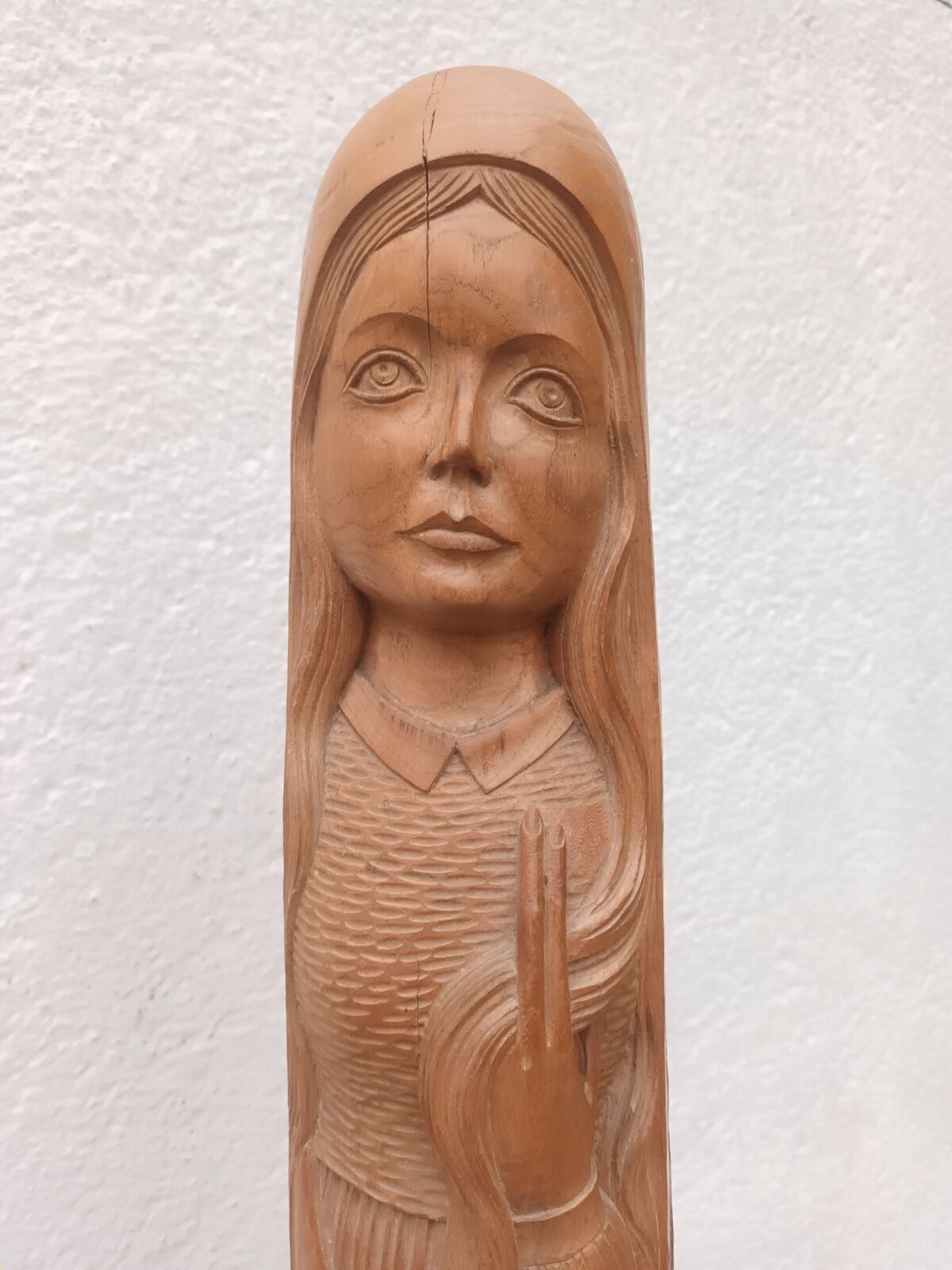 Young woman sculpture by Ray Boterf