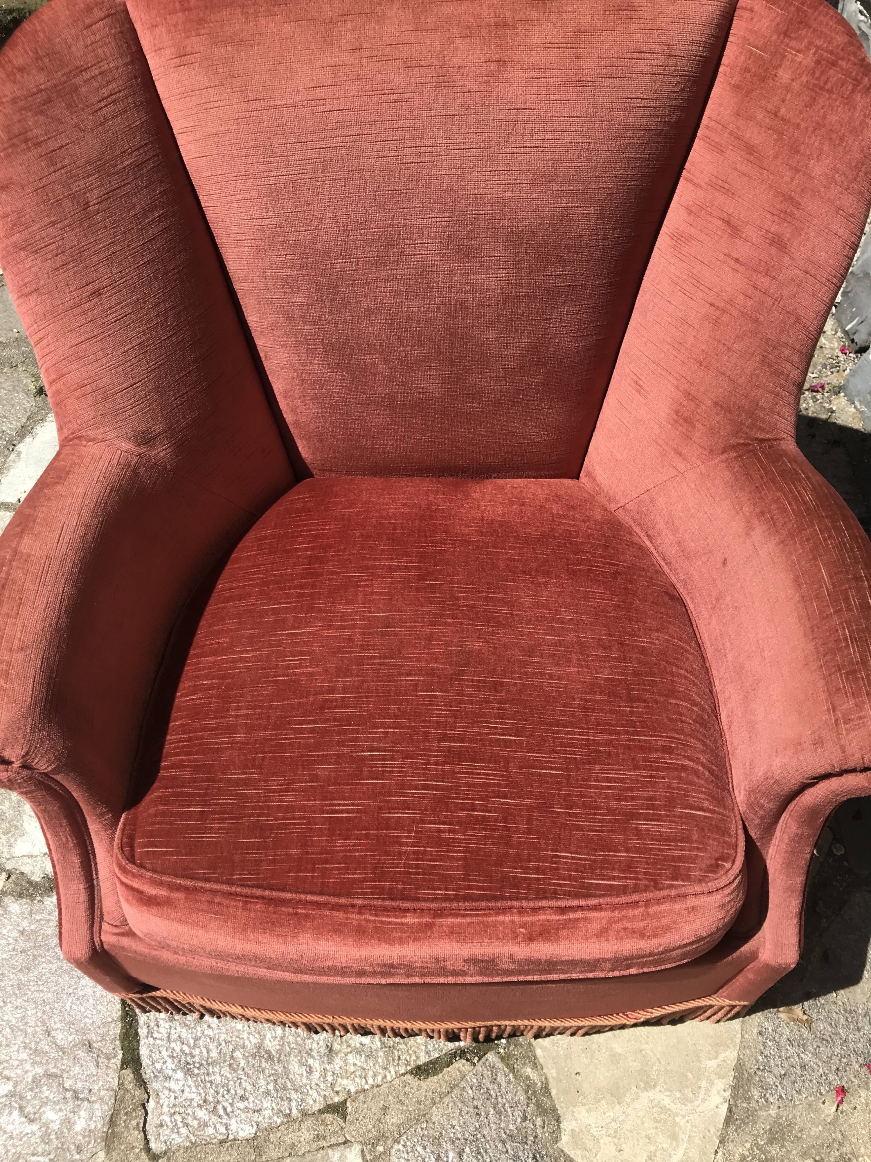 Vintage pink velvet armchair with fringes