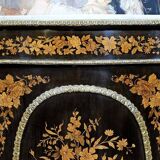 Boulle furniture with a curved shape from the Napoleonic III era in lacquered wood and marquetry.