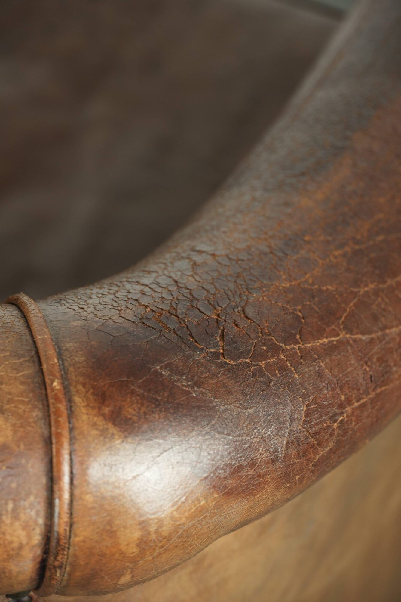 Vintage sheepskin club armchair finished with decorative nails