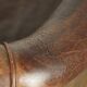 Vintage sheepskin club armchair finished with decorative nails