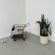 Perforated metal serving trolley in the Mathieu Matégot style