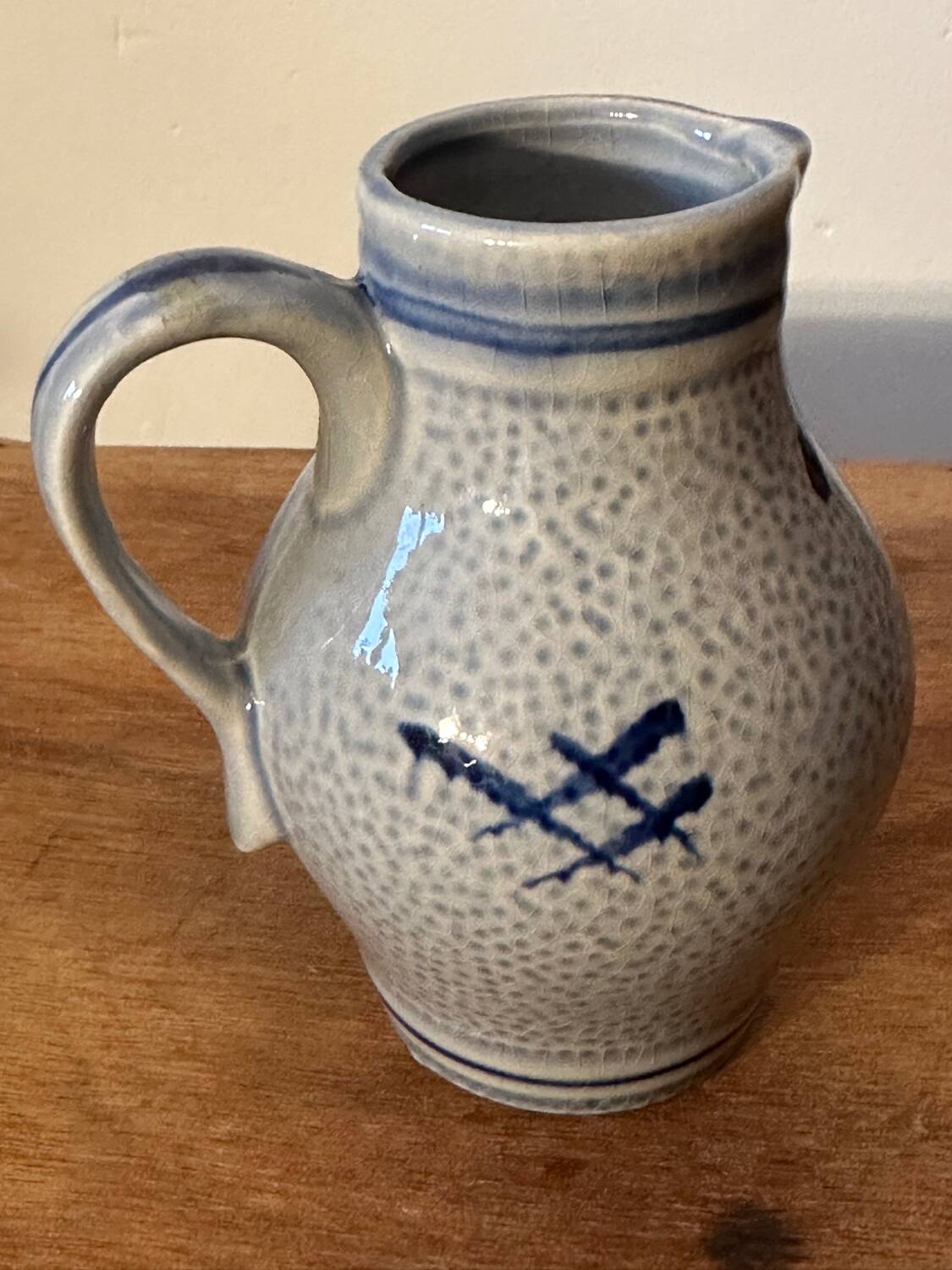 Small stoneware pitcher with salt from Alsace, early 20th century, height 12.5 cm