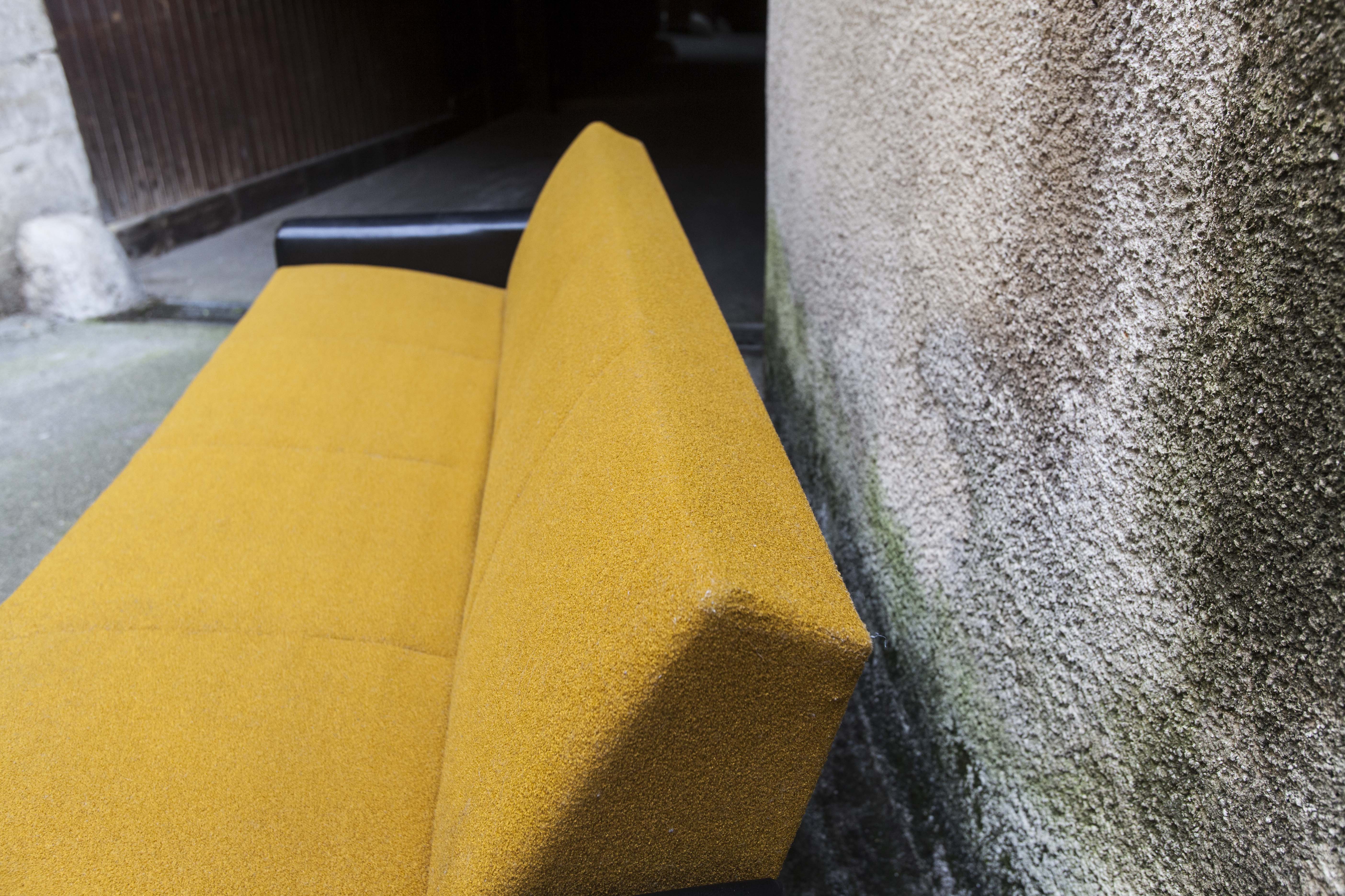 The 1970s gold and black Daybed couch