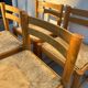 4 vintage chairs made of solid wood and woven straw
