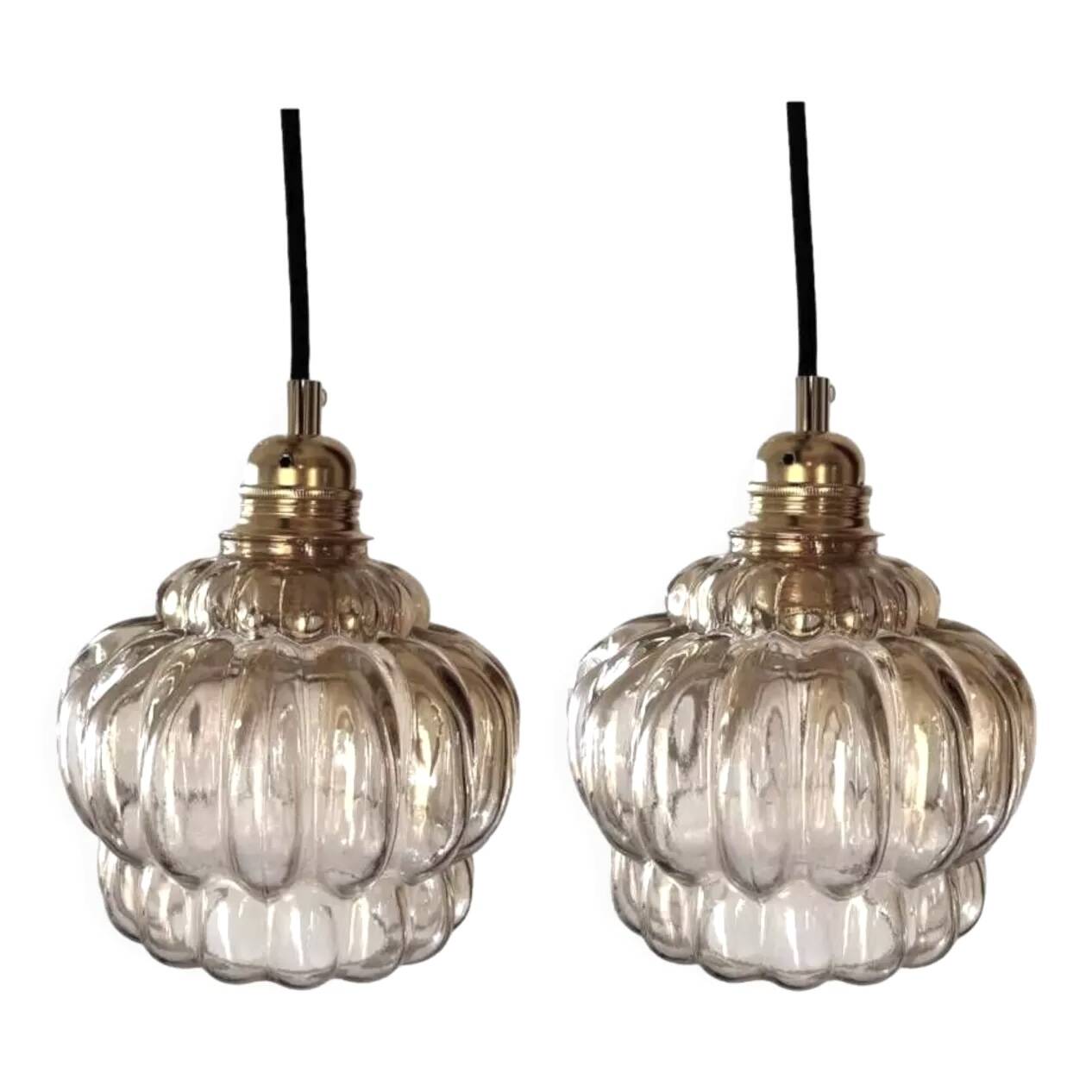 Pair of vintage amber glass pendant lights