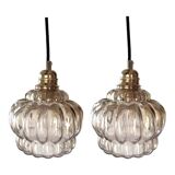 Pair of vintage amber glass pendant lights