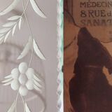 Beveled mirror with floral decor