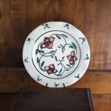 Meyssac plate decorated with flowers on cracked background early twentieth century and its support