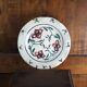 Meyssac plate decorated with flowers on cracked background early twentieth century and its support