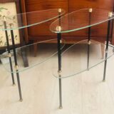2 small side tables in glass and Bakelite with gold nuts from the 1960s.