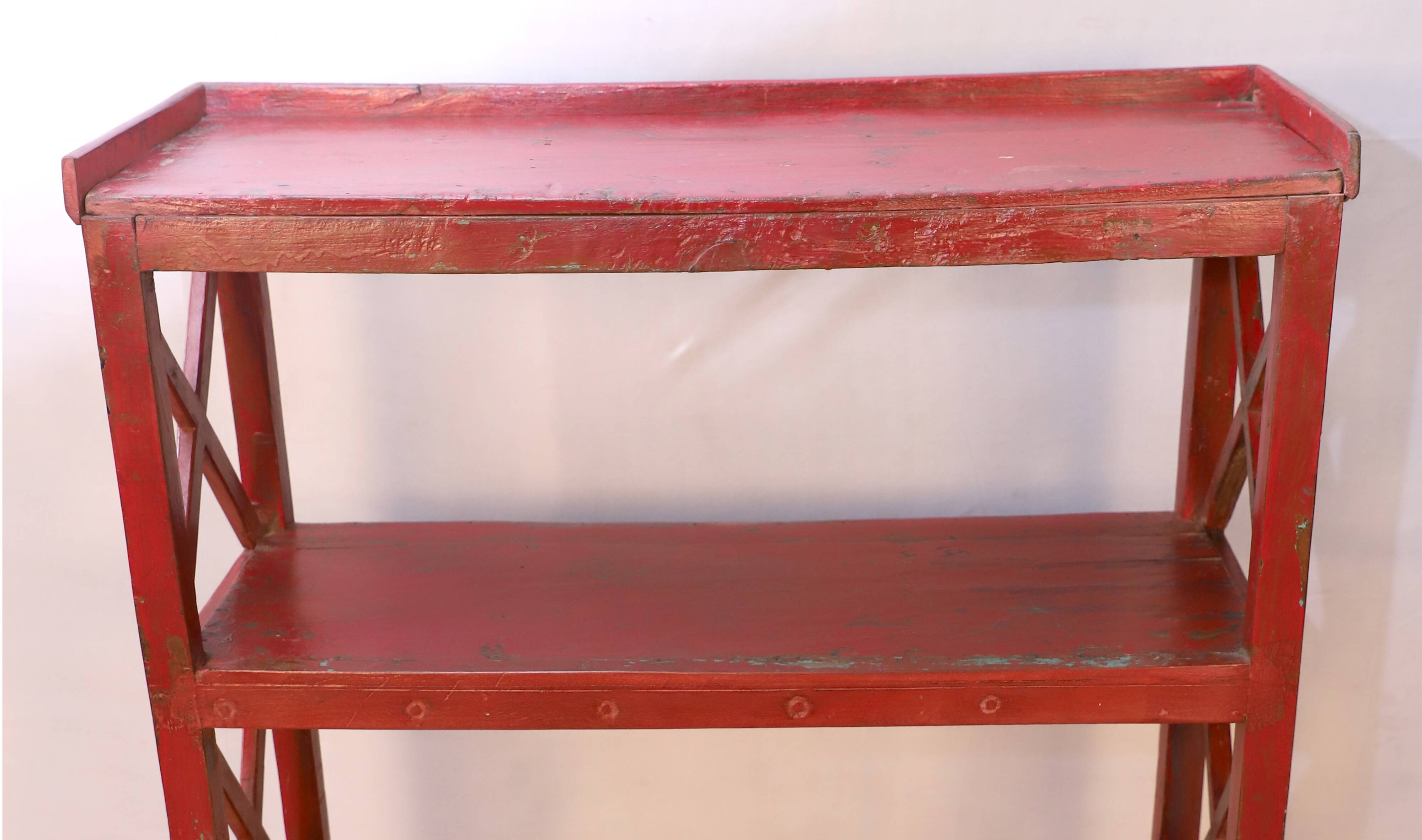 Burmese teak bookcase with original red patina