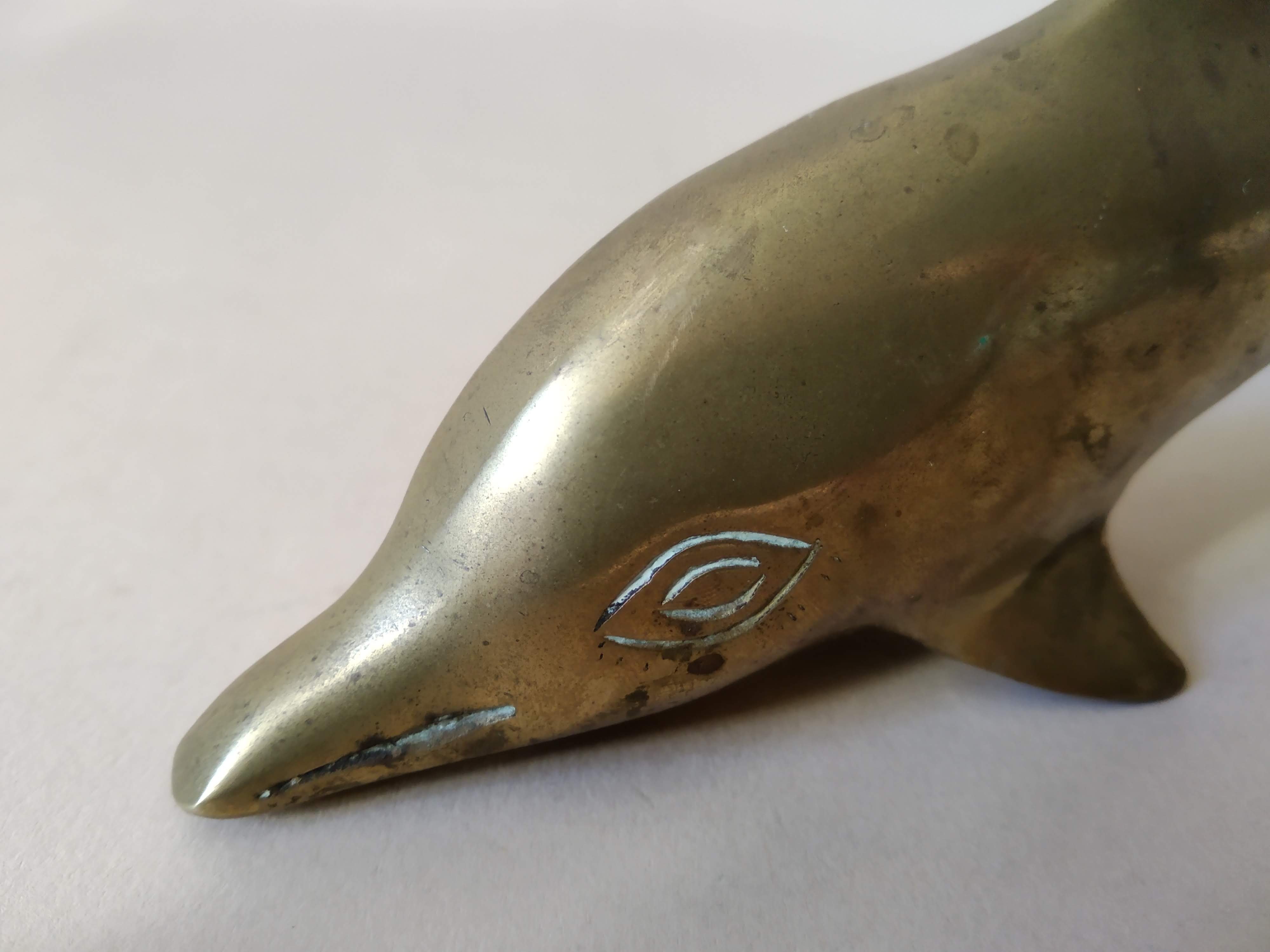 Patinated brass dolphin