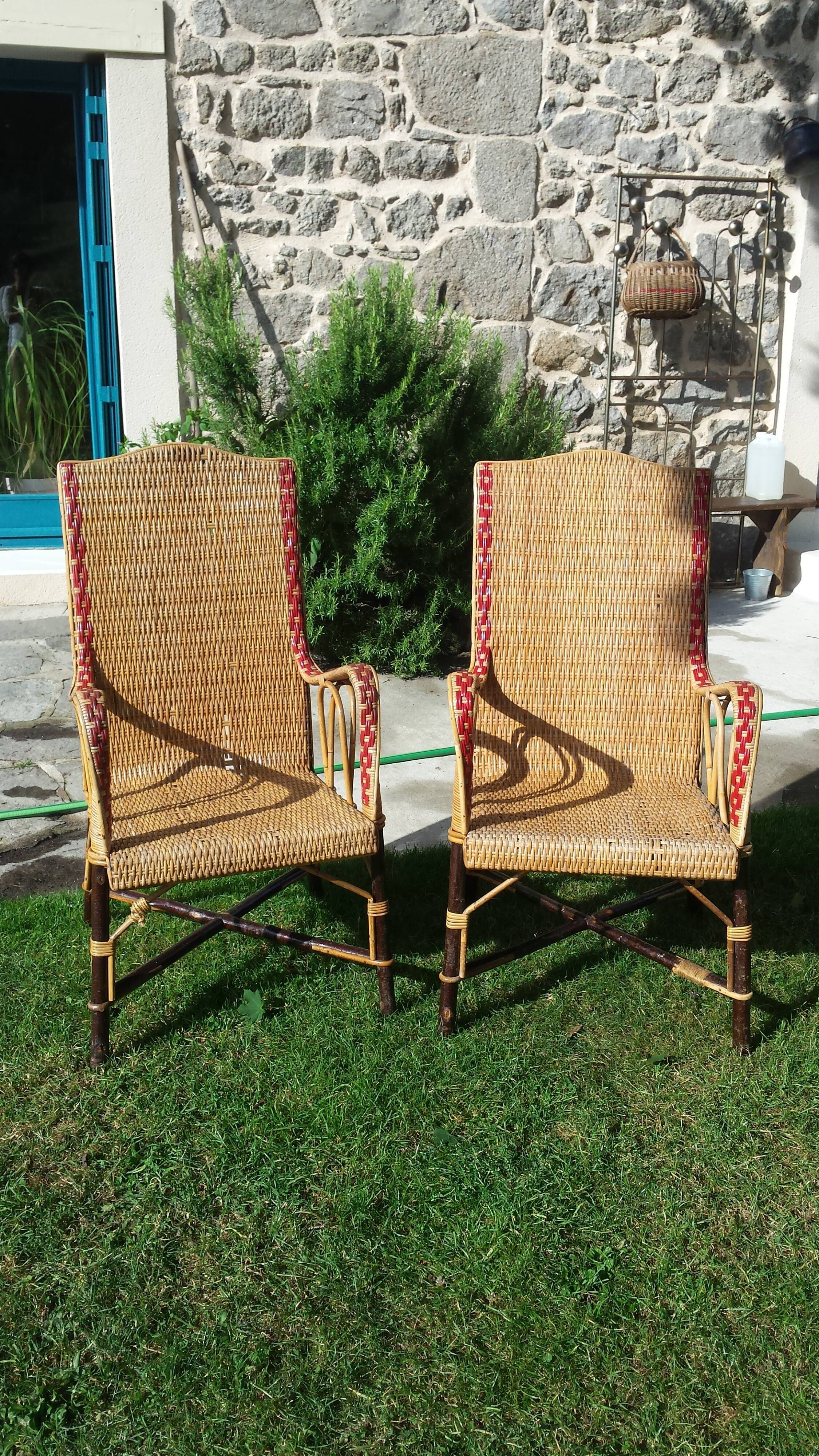 Wicker or rattan armchairs and bamboo
