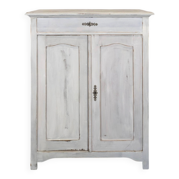 Petit buffet deux portes un tiroir en bois patiné blanc