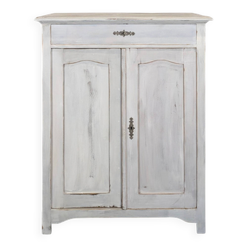 Petit buffet deux portes un tiroir en bois patiné blanc