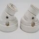 Duo of white ceramic wall lamps