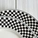 Pair of vintage plates with a black and white checkered pattern.