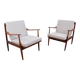 Vintage teak lounge chair, retro 1960s–70s style.